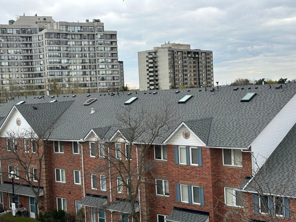 Wide view of completed townhouse roofs
